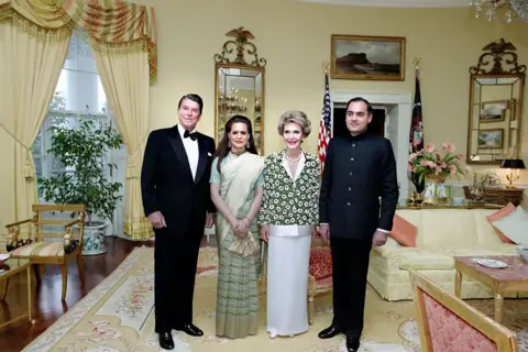 Universal Images Group via Getty Images U.S. President Ronald Reagan and U.S. First Lady Nancy Reagan with Indian Prime Minister Rajiv Gandhi and his wife Sonia Gandhi in The Yellow Oval Room during a state dinner.