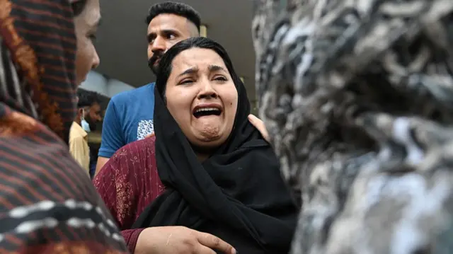 Pakistani PM suspends top health official after 14 newborn babies killed in hospital fire - BBC News