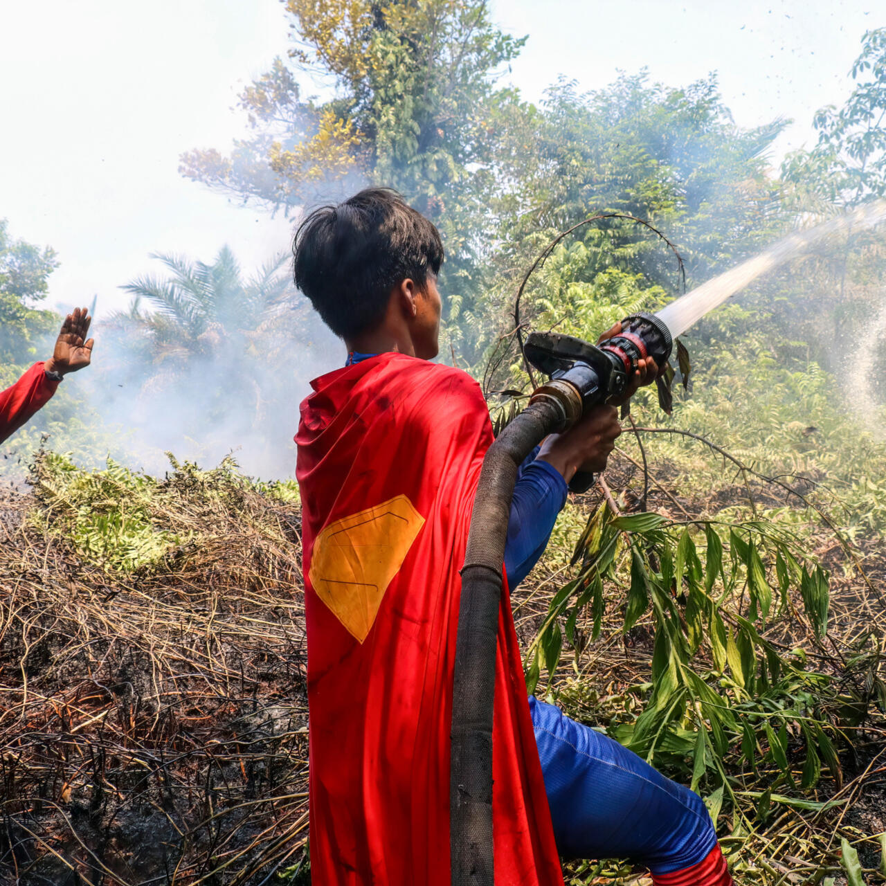Keep up the spirit': Indonesian teenage 'Superman' joins wildfire fight